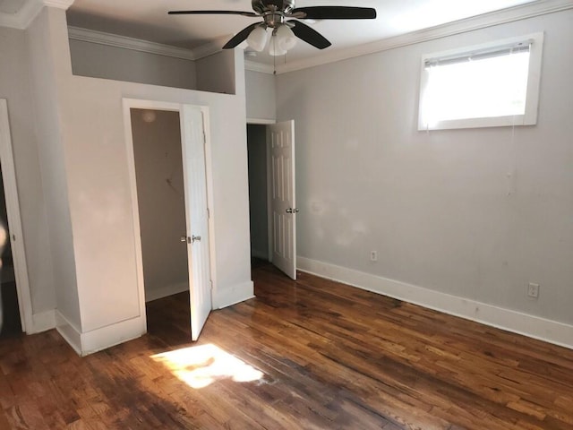 unfurnished bedroom featuring ornamental molding, dark hardwood / wood-style floors, and ceiling fan