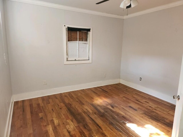 empty room with crown molding, hardwood / wood-style flooring, and ceiling fan