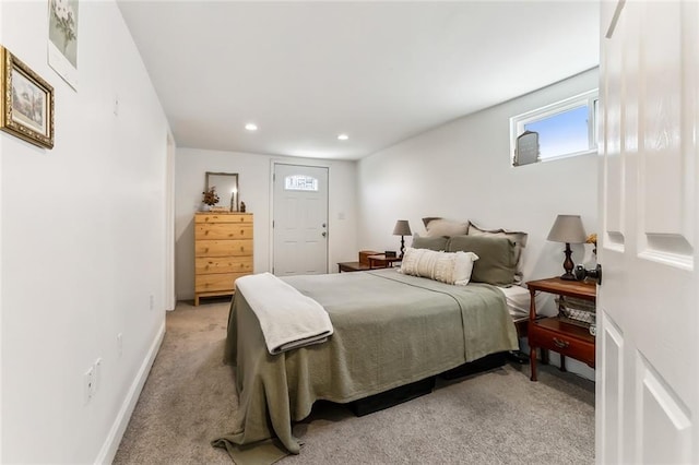 bedroom with light carpet