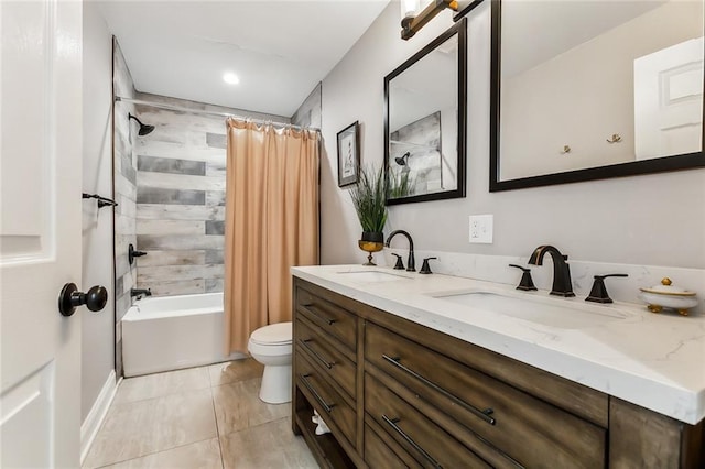 full bathroom featuring tile patterned flooring, vanity, shower / tub combo with curtain, and toilet