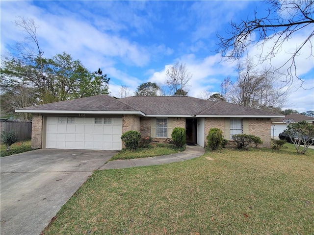 single story home featuring a front lawn and a garage