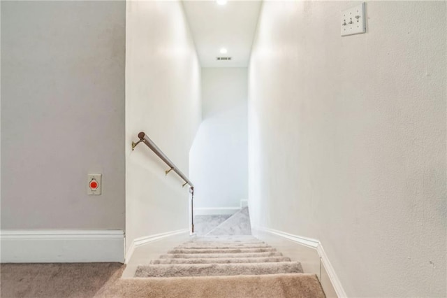staircase featuring baseboards, carpet flooring, recessed lighting, and visible vents