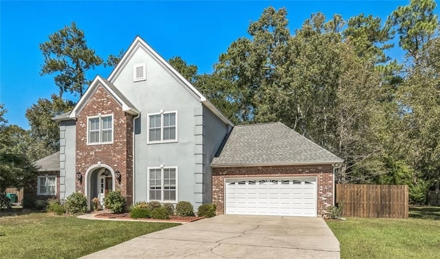 traditional home featuring an attached garage, a front lawn, brick siding, and concrete driveway