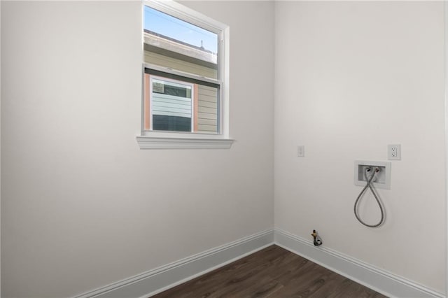 laundry area with gas dryer hookup, washer hookup, and dark wood-type flooring