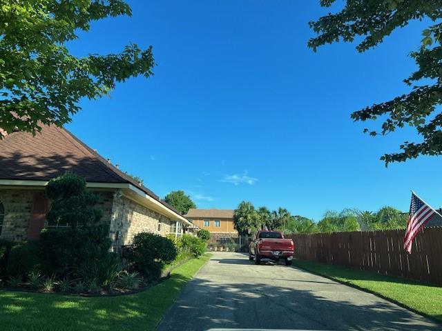 11051 Lake Forest Blvd, New Orleans, LA 70127 - view of property exterior with fence