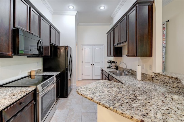 kitchen with ornamental molding, light stone countertops, black appliances, and sink