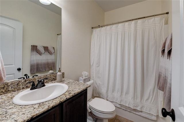 full bathroom featuring vanity, shower / bath combo with shower curtain, toilet, and tile patterned flooring