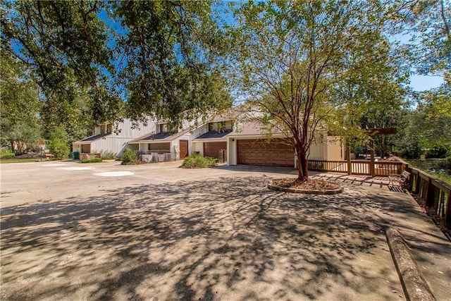 64 Fairway View Dr Unit 1, Hammond, LA 70401 - view of front of home with concrete driveway and a garage