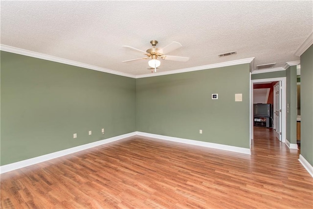 64 Fairway View Dr Unit 1, Hammond, LA 70401 - spare room with light wood finished floors, baseboards, visible vents, a ceiling fan, and crown molding