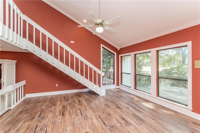 64 Fairway View Dr Unit 1, Hammond, LA 70401 - unfurnished living room featuring a ceiling fan, vaulted ceiling, baseboards, ornamental molding, and wood finished floors