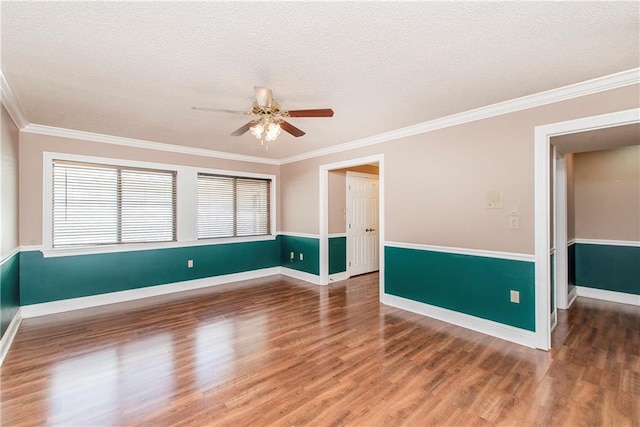 64 Fairway View Dr Unit 1, Hammond, LA 70401 - spare room featuring crown molding, a textured ceiling, ceiling fan, and wood finished floors