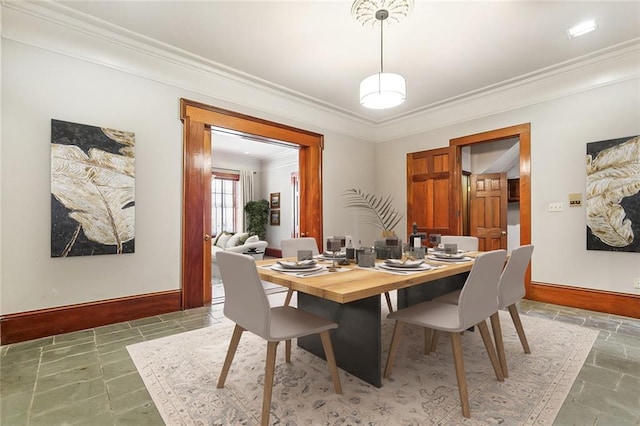 dining room with ornamental molding