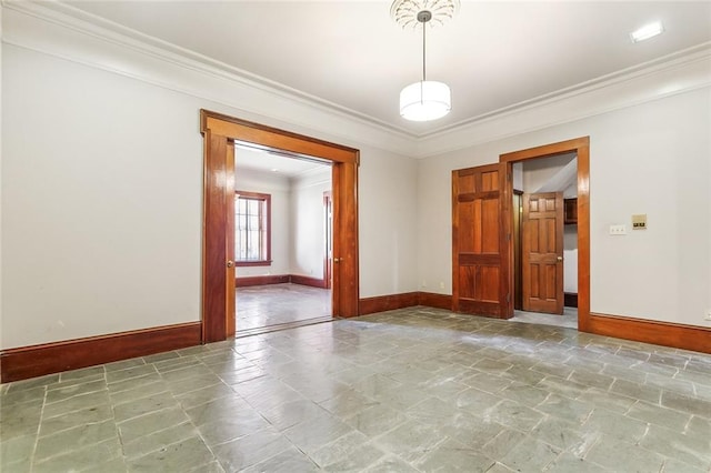 unfurnished room featuring ornamental molding