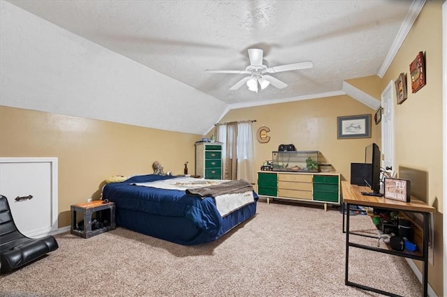 carpeted bedroom with a textured ceiling, vaulted ceiling, ceiling fan, and crown molding