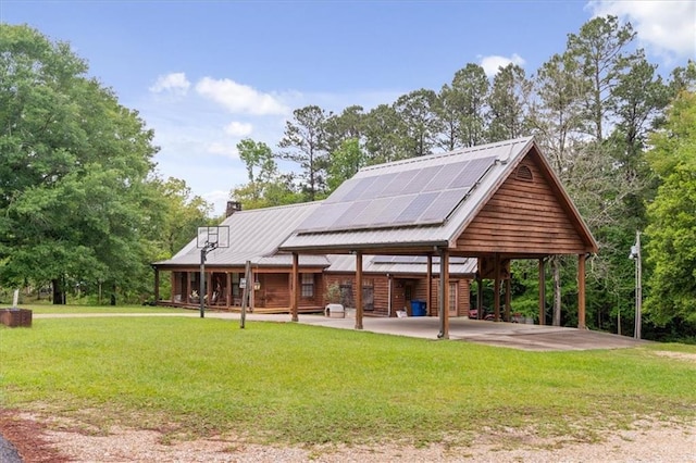 surrounding community with a yard and a carport