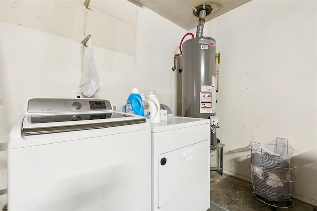 laundry room with washer and dryer and gas water heater