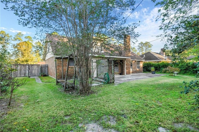 view of yard with a patio area