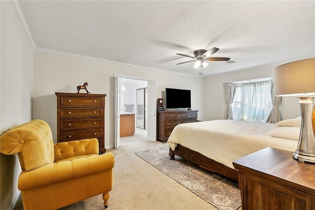 carpeted bedroom featuring ensuite bath, crown molding, a textured ceiling, and ceiling fan