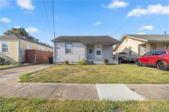 bungalow with a front lawn