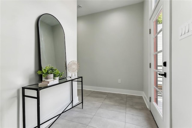 610 David St, New Orleans, LA 70119 - foyer entrance featuring light tile patterned flooring and baseboards