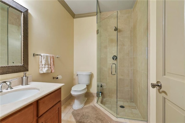 bathroom with toilet, tile patterned floors, an enclosed shower, ornamental molding, and vanity