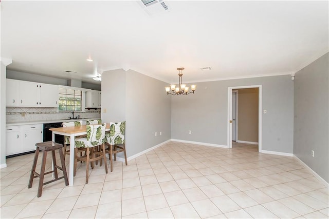 20 Silman Ave, Hammond, LA 70403 - dining room with a chandelier, crown molding, and baseboards