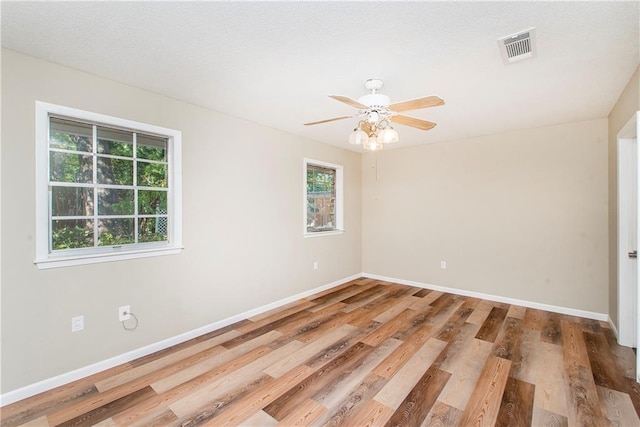 20 Silman Ave, Hammond, LA 70403 - empty room with baseboards, wood finished floors, and ceiling fan
