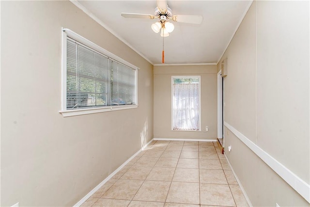 20 Silman Ave, Hammond, LA 70403 - spare room featuring light tile patterned floors, a ceiling fan, and ornamental molding