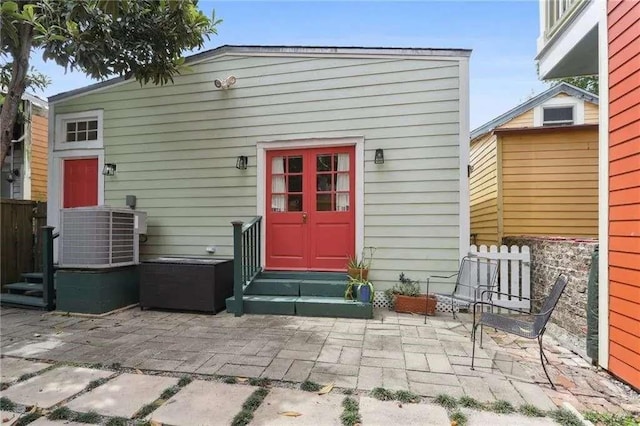 rear view of house with a patio