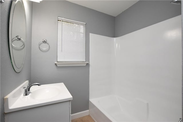 bathroom with shower / bath combination and vanity