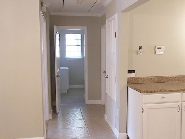 corridor featuring ornamental molding