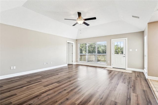 unfurnished living room featuring lofted ceiling, wood-type flooring, and ceiling fan