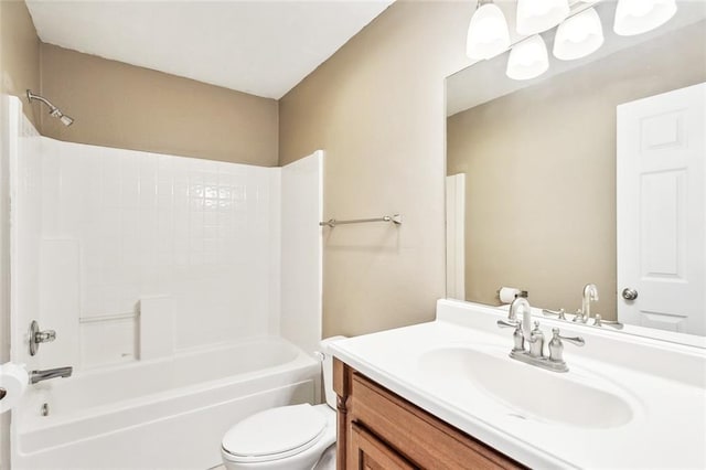 full bathroom with vanity, bathtub / shower combination, and toilet