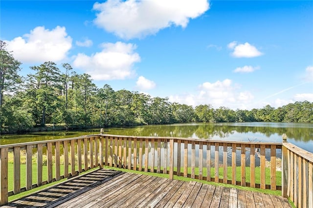 wooden terrace with a water view