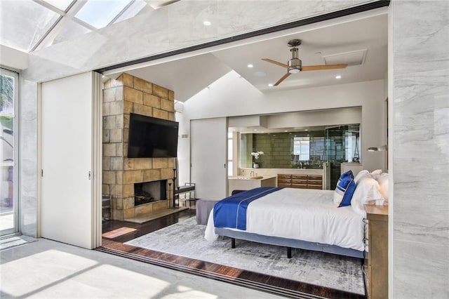 620 Decatur St Unit Phb3, New Orleans, LA 70130 - bedroom featuring access to exterior, ensuite bath, and a fireplace