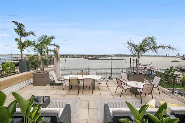 view of patio / terrace with a water view