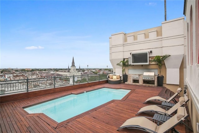 620 Decatur St Unit Phb3, New Orleans, LA 70130 - view of pool featuring a deck, area for grilling, a fenced in pool, and fence