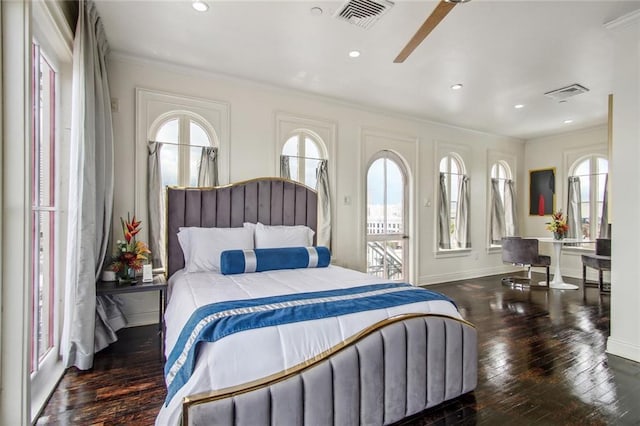 620 Decatur St Unit Phb3, New Orleans, LA 70130 - bedroom featuring crown molding, hardwood / wood-style flooring, visible vents, and multiple windows