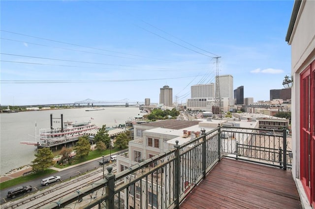 balcony featuring a water view