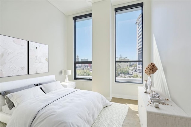 bedroom featuring wood-type flooring