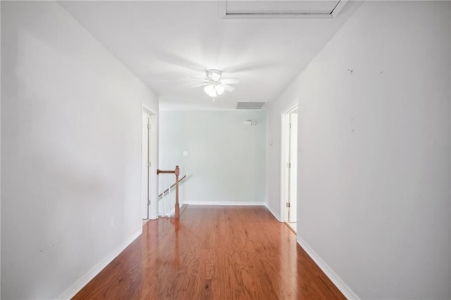 hallway featuring hardwood / wood-style floors