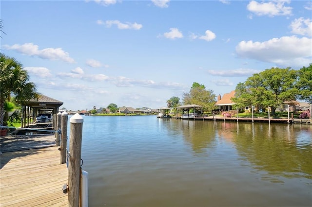 dock area with a water view