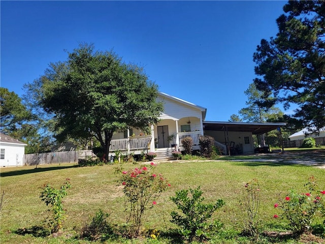 view of front facade with a porch and a front lawn