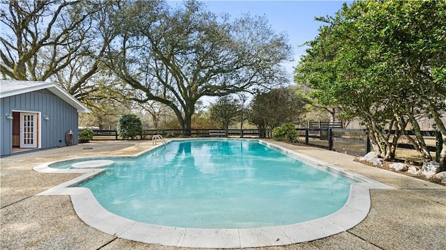 view of pool featuring a fenced in pool, a patio, and a fenced backyard