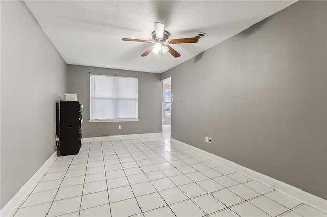 113 Winnona Dr, Avondale, LA 70094 - spare room with a ceiling fan, a textured ceiling, and baseboards