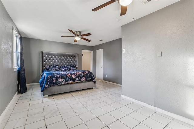 113 Winnona Dr, Avondale, LA 70094 - bedroom featuring baseboards, ceiling fan, and light tile patterned floors
