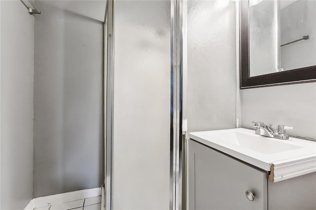 113 Winnona Dr, Avondale, LA 70094 - bathroom featuring vanity, tile patterned floors, and a shower