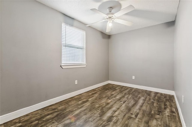 113 Winnona Dr, Avondale, LA 70094 - empty room with dark wood-type flooring, baseboards, ceiling fan, and a textured ceiling