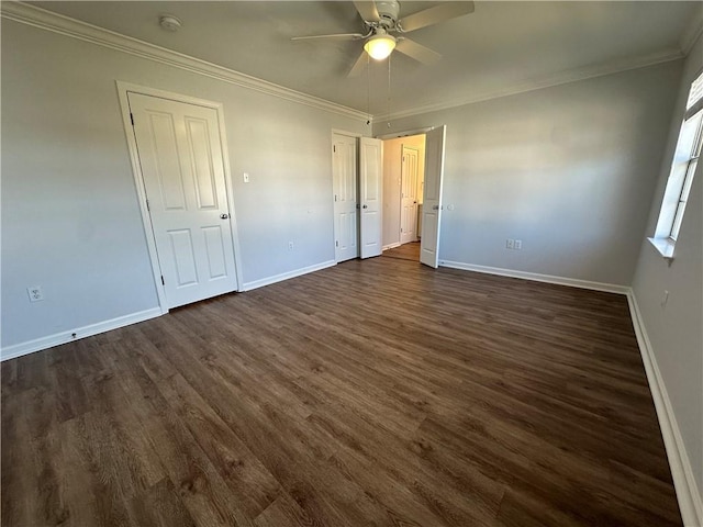 unfurnished bedroom with ceiling fan, crown molding, and dark hardwood / wood-style flooring