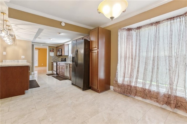 kitchen featuring backsplash, crown molding, and appliances with stainless steel finishes